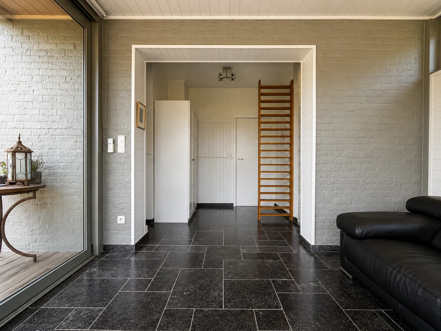 Veranda met zicht op de tuin